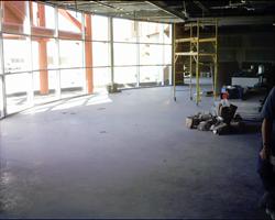 The conference room has a bare floor and an incomplete ceiling as construction continues. - , Utah